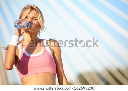 Fit woman in nature in spring