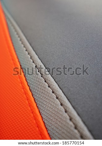 Red and grey sewing leather texture