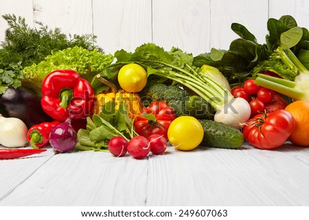 Fruit and vegetable borders on white wooden old table
