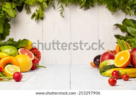Fruit and vegetable borders Fruit and vegetable borders on wood table