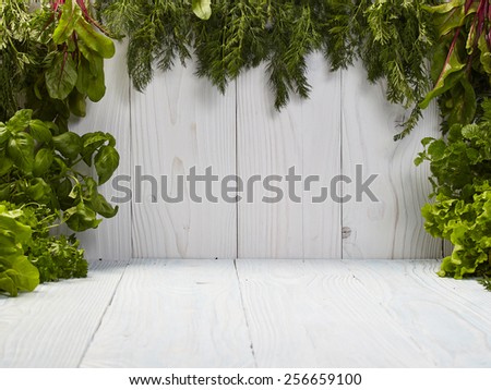 Green frame on white boards made from herbs
