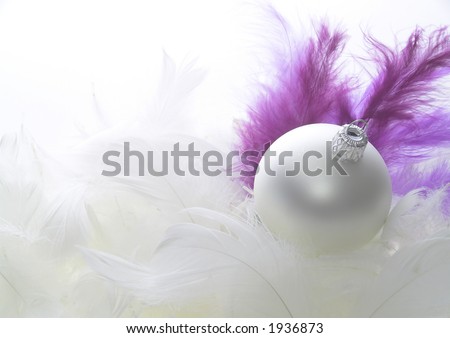 christmas decoration on white feathers