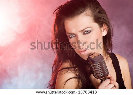Girl Singing In Retro Mic. Singer on stage