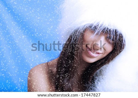 stock photo : Winter Girl with beautiful make up, silver gloves and snow 