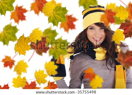 Beautiful  woman wearing hat and gloves  and maple leaves