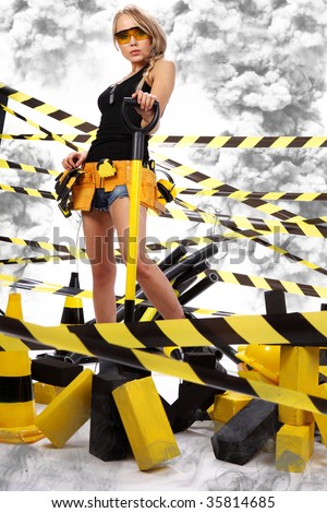 Female construction worker . Black and yellow concept.