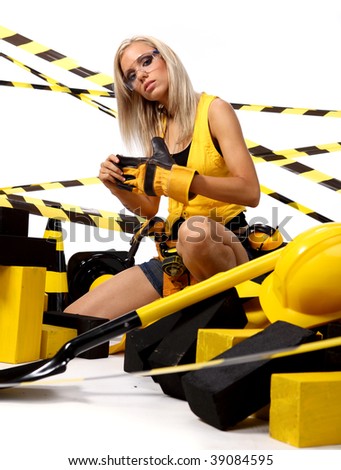 Sexy blonde female construction worker