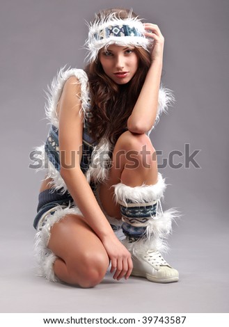 emotion winter sexy woman on grey background in studio