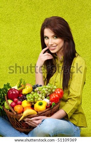 Woman with fruits and vegetables . Spring concept