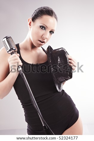 Sexy singer girl singing and dancing