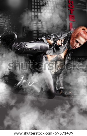 stock photo : beautiful sexy girl holding gun . smoke background holding gun. stock photo : beautiful sexy girl holding gun . smoke background