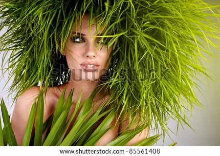 Young  woman and abstract green hair - stock photo