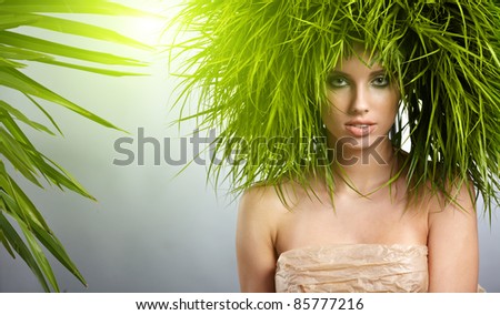 Young  woman and abstract green hair