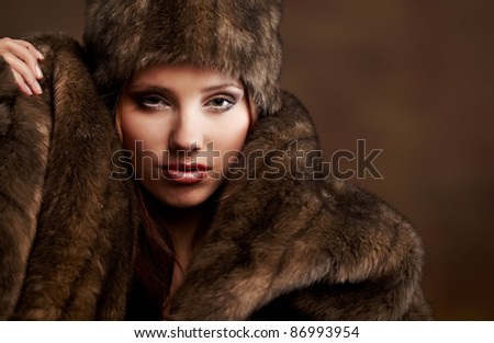 portrait of a beautiful woman wearing fur