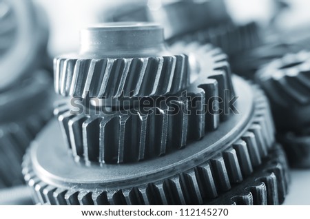 industrial gear machinery, engineering parts in blue toning