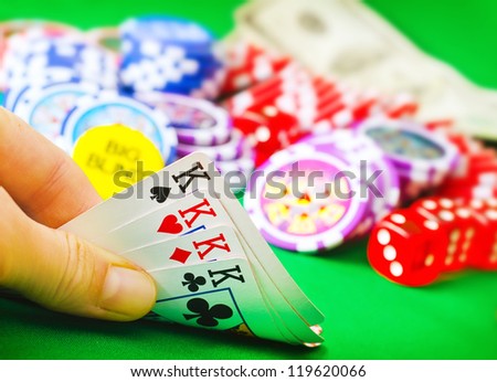 Card for poker in the hand, chips and card for poker