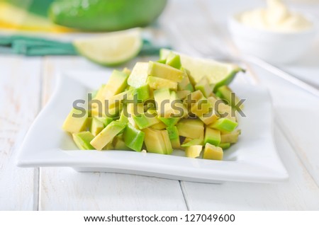 salad with white sauce and avocado