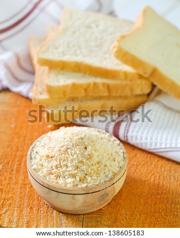 Bread crumbs on white kitchen bowl