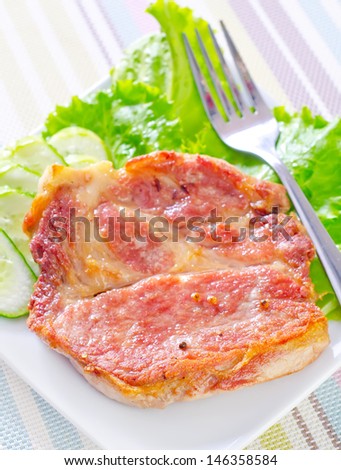 baked meat with cucumber