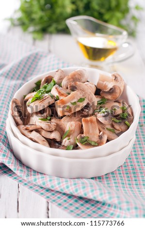 Cooked mushrooms with parsley and oil