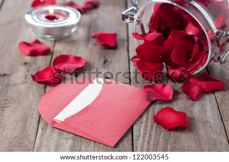 Romantic letter and petals, selective focus