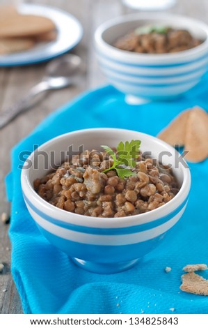 Cooked lentil with carrot and zucchini, selective focus