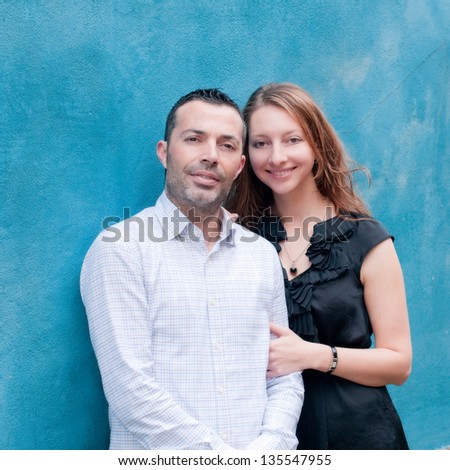 Happy beautiful couple in the small italian city