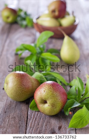 Sweet fresh pears on the wooden table