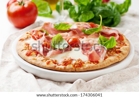 Italian Pizza With Mozzarella, Ham And Tomato, Selective Focus