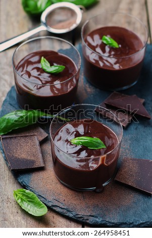 Chocolate mousse with basil, selective focus