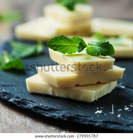 White chocolate with mint, selective focus and square image