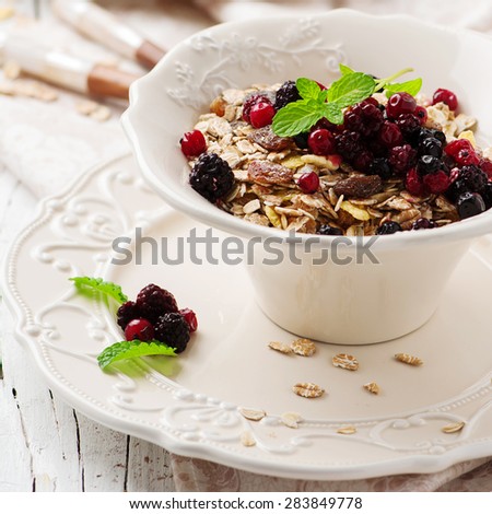 Concept of healthy breakfast with muesli, selective focus and square image