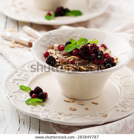 Concept of healthy breakfast with muesli, selective focus and square image