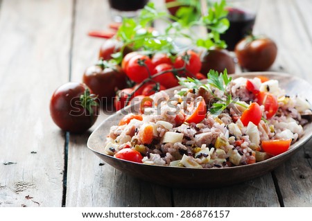 Traditional italian rice salad with tuna and vegetables, selective focus