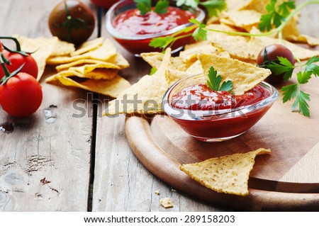 Concept of mexican food with spicy salsa, selective focus