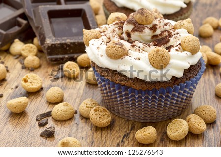 chocolate muffin with italian pastries called amaretti