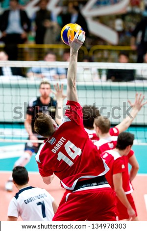 MILAN, ITALY - APRIL, 4:Baroti ( Red Monza) jumping ball   in A2M PLAY - OFF Vero Volley Monza -  Corigliano on April ,4 2013 in Milan, Italy