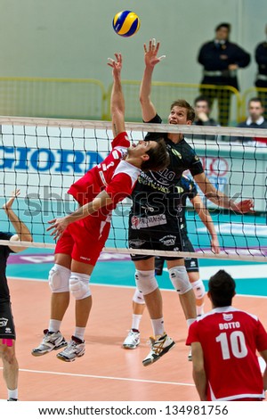 MILAN, ITALY - APRIL, 10: Tiberti (red number 3 Monza )  in A2M PLAY - OFF Vero Volley Monza -  Corigliano on April 10, 2013 in Milan, Italy