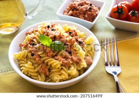 tuna pasta with black peppers  and basil leaf