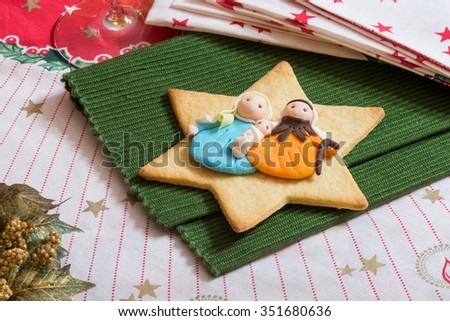 Christmas cookie with decorations: Jesus, Joseph and Mary