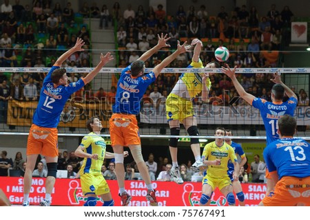 MONZA, ITALY - APRIL 20:  Sebastian Creus Larry ( Number 15 yellow) in Volley Gabeca Monza ( Blue) vs Volley Modena ( Yellow) -Italian Volley League on 2011 April, 20 in Monza (Italy)