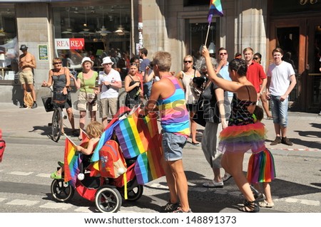 STOCKHOLM - AUGUST 03: A Rainbow Family at Gay Pride Parade in Stockholm, Sweden, on August 03, 2013, the biggest pride parade in Scandinavia