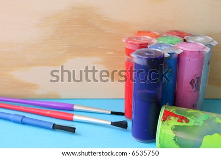 Arts and crafts paint, brushes and wooden items