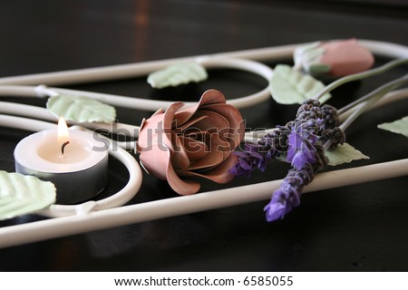 Wrought Iron flower design with candles and lavender