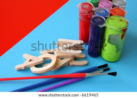 Arts and crafts paint, brushes and wooden items