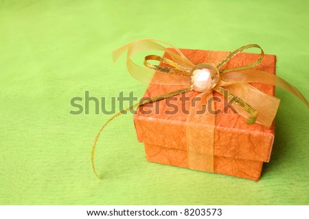 Brown Gift box with gold and copper ribbon