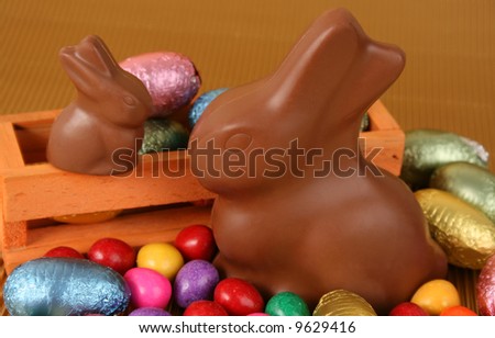 Various colors and shaped easter eggs and bunnies