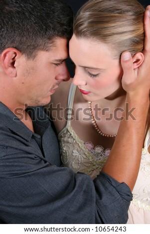 Young couple in love, faces close to one another
