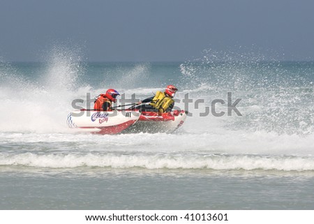 STRAND, RSA - OCTOBER 24: Western Cape regional heat for the inflatable boat race series on October 24, 2009 at Strand in the Western Cape Province, South Africa.