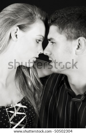 Young caucasian couple in love, noses touching